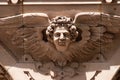 Angel head with wings above a doorway Royalty Free Stock Photo