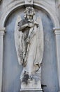 Angel holding a cross, San. Michele Cemetery, Venice Royalty Free Stock Photo