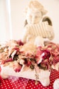 Angel on Dried Burgundy Hydrangea Flowers Decoration Royalty Free Stock Photo