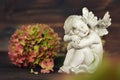 Angel and hydrangea flower Royalty Free Stock Photo