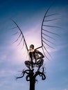 Angel I monument, skeleton of an angel with wings at sunrise