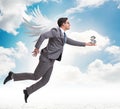 Angel investor concept with businessman with wings Royalty Free Stock Photo