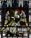 Angel making music in stained glass