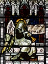 Angel making music in stained glass