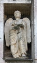 Angel, marble statue on the Baptistery, Parma, Italy
