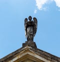 An Angel at mausoleum top in sunny day Royalty Free Stock Photo