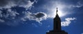 Angel Moroni on Top of Mormon LDS Temple with Sky and Clouds Sunstar Bright Holy Light