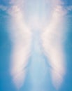 Angel shape on blue background Royalty Free Stock Photo