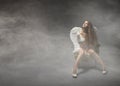Angel sitting in a lcoud of fog Royalty Free Stock Photo