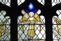 Angel with star in stained glass Royalty Free Stock Photo