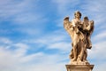 Angel statue by Bernini along Sant`Angelo bridge in Rome