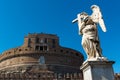 Angel statue on a bridge in front of the Castel Sant`Angelo in R Royalty Free Stock Photo