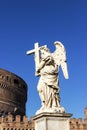 Angel statue with a cross, Castel Sant`Angelo, Rome, Italy. Blue sky Royalty Free Stock Photo