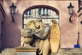 Angel statue in front of gate on Malostransky cemetery, Prague