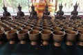 Angel statue and monk's alms bowl with put the coins