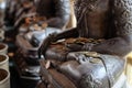 Angel statue and monk's alms bowl with put the coins