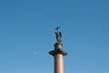 Angel statue holding cross in St. Petersburg with moon Royalty Free Stock Photo