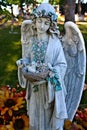 Angel statue in sunny garden Royalty Free Stock Photo