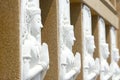 Angel statue on the wall of a temple in Thailand Royalty Free Stock Photo