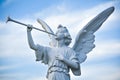 Angel Statue Blowing a Horn, Sky Background