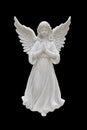 Angel statues isolated on black background