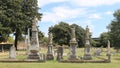 Angel Statues surrounded by tombstones