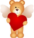 Angel teddy bear holding a heart