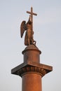 Angel on top of the Alexander Column (1834) in the light of the setting sun. Saint-Petersburg