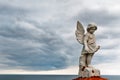Angel under storm clouds Royalty Free Stock Photo