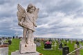 Angel under storm clouds