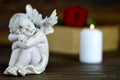 Angel, white candle and red rose Royalty Free Stock Photo