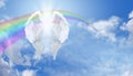 Angel Wings and Rainbow on Blue Sky Royalty Free Stock Photo