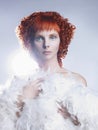 Angelic woman with red hair hairdo Royalty Free Stock Photo