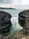 Girl at Angels Billabong, Nusa Penida Bali Indonesia Royalty Free Stock Photo