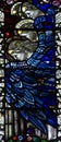 Angels with blue wings in stained glass