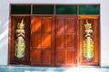 The angels are carved in the door of the temple , Shan style