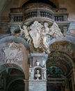 Angels supporting the emblem of Pope Alexander VII, in the Basilica of Santa Maria del Popolo in Rome, Italy.