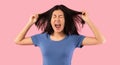 Portrait of angry emotional asian woman screaming Royalty Free Stock Photo