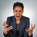 Anger, frustrated and portrait of black woman in studio for screaming, problem and crazy. Mental health, rage and angry Royalty Free Stock Photo