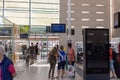 Angers France - August 22 2020: people look at the arrival and departure board at the railway station, they wearing