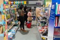 Angers, France - August 27 2020: people wearing face protective mask while shopping school supplies in the supermarket Royalty Free Stock Photo