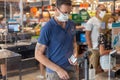 Angers France - August 13 2020: protective shield in the store at the checkout Royalty Free Stock Photo