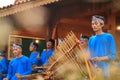 Angklung players in action at an event