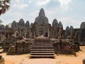 Angkor Thom Temple. The ancient stone faces of Bayon temple. Siem Reap, Cambodia Royalty Free Stock Photo