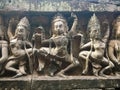 Apsara dancers carved on the wall of Prasat Bayon Khmer ancient temple. Angkor Wat in Siem Reap, Cambodia. Royalty Free Stock Photo