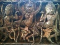 Angkor Wat in Siem Reap, Cambodia. Apsara dancers carved on on the frontage of the Terrace of the Leper King. Wall Carving