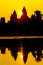 Angkor Wat at sunrise across the lake, reflected in water Royalty Free Stock Photo