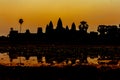 Angkor Wat at sunrise across the lake, reflected in water Royalty Free Stock Photo