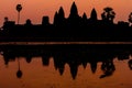 Angkor Wat at sunrise across the lake, reflected in water Royalty Free Stock Photo