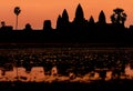 Angkor Wat at sunrise across the lake, reflected in water Royalty Free Stock Photo